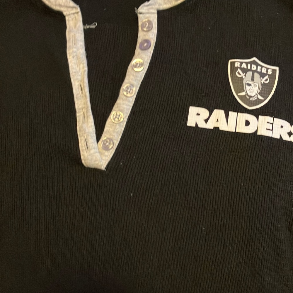 Black long sleeved raiders shirt great if you love football and the Raiders